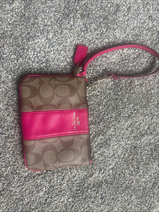 Coach Handbags - Coach Brown Signature Canvas Wristlet with Pink Leather Accent